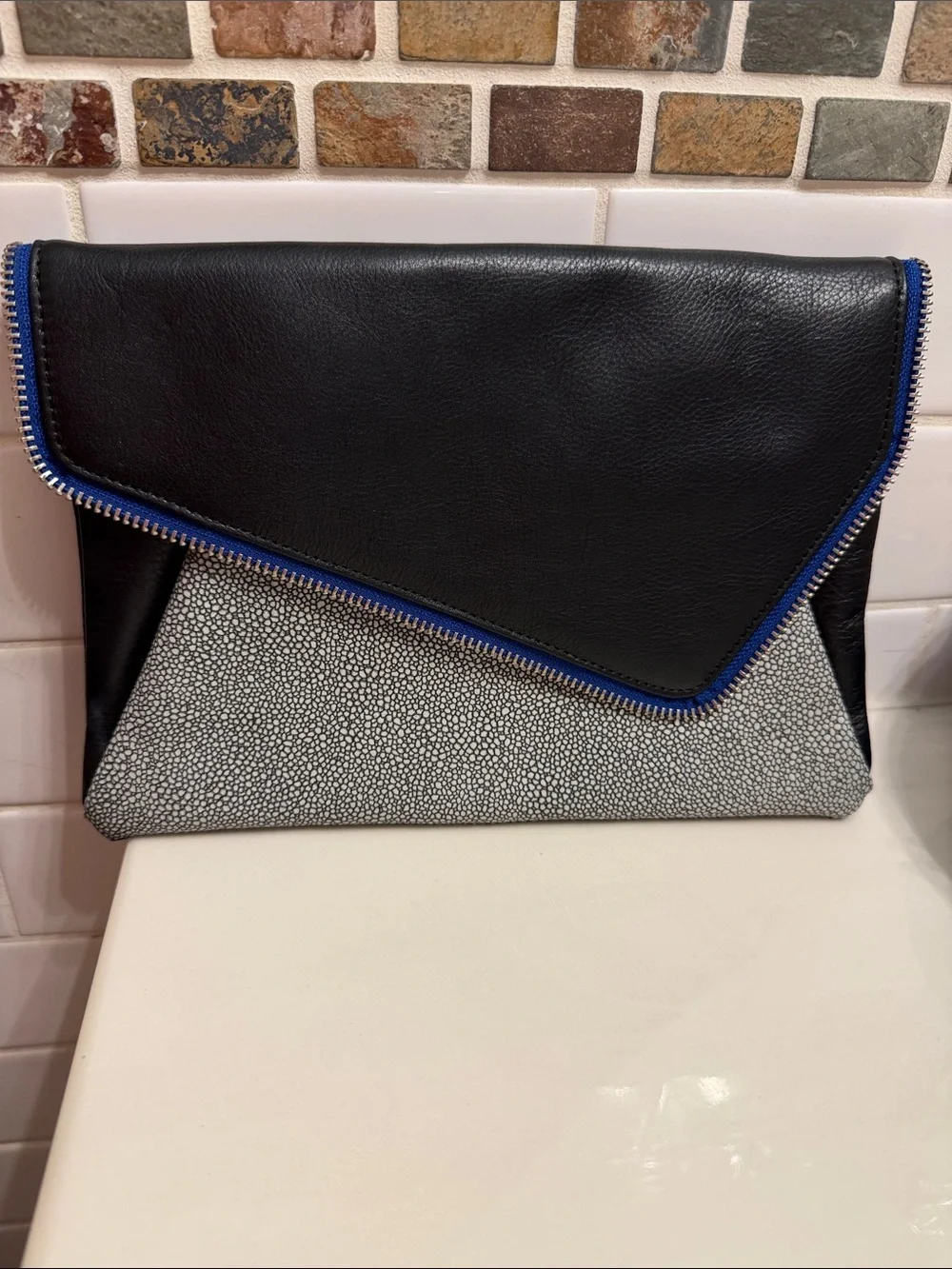 Halogen Black Clutch with Gray Pebbled Panel and Blue Trim